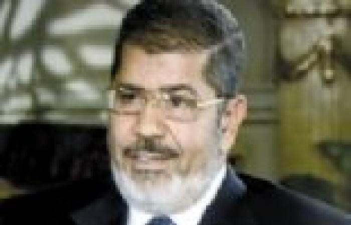 مرسي يستقبل وفدا من علماء المسلمين ويؤكد موقف مصر لحل الأزمة السورية