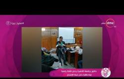 السفيرة عزيزة -  دكتور بجامعة القاهرة يحمل طفلة رضيعة إبنة طالبة داخل لجنة الإمتحان