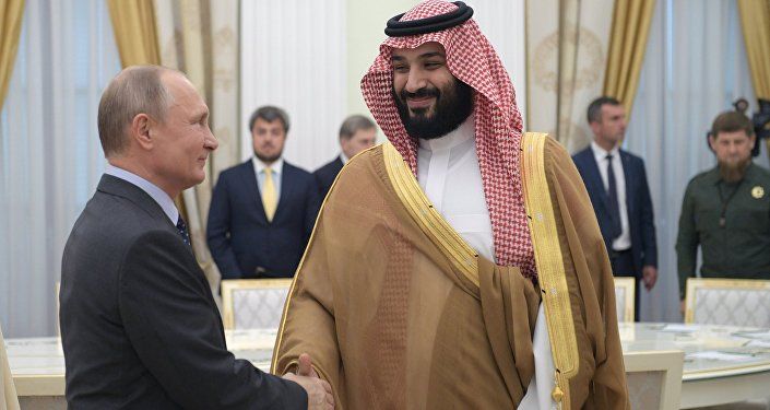 بوتين خلال لقائه ولي العهد السعودي محمد بن سلمان