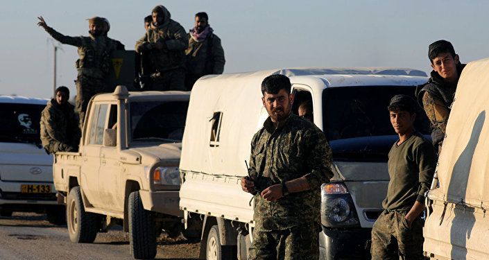 مقاتلون من قوات سوريا الديمقراطية في الباغوز بسوريا