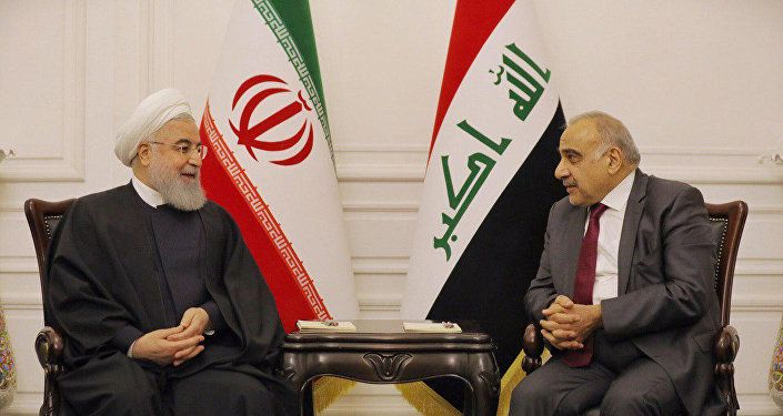 رئيس الوزراء العراقي عادل عبد المهدي مع الرئيس الإيراني حسن روحاني في بغداد في 11 مارس / أذار 2019