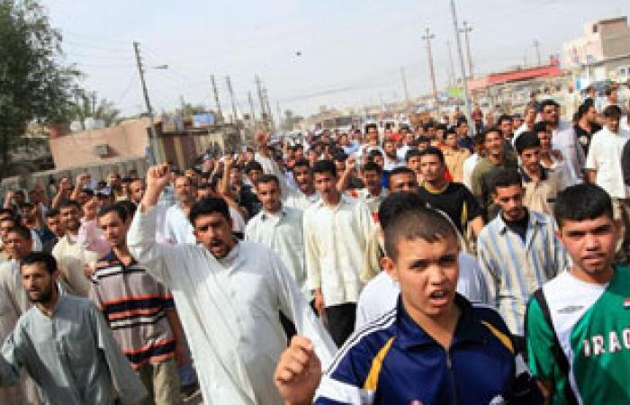 عراقيون يحيون ذكرى وفاة الإمام على بالتطبير