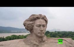 غرق جزيرة مع تمثال ماو تسي تونغ العملاق في الصين