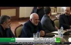 طهران تطالب الوكالة الذرية بالحياد