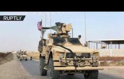 قوافل القوات الأمريكية تسير بالقرب من حقول النفط شمال شرق سوريا