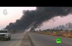 الدخان يتصاعد في مدينة تل تمر شمال سوريا