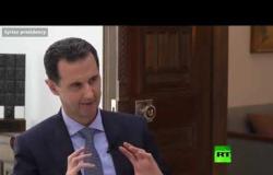 الأسد يوضح سبب قيادة سيارته بنفسه