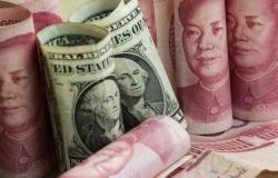 الدولار يتراجع أدنى 6.9 يوان صيني لأول مرة منذ أغسطس