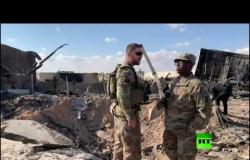 جنود أمريكيون يزيلون الركام إثر القصف الإيراني قاعدة عين الأسد