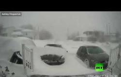بتقنية "تايم لابس".. الثلوج تغمر السيارات في كندا