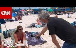 مراسل CNN يناقش مرتادي أحد الشواطئ الأمريكية.. "جميعنا سنموت"