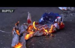 حرق العلم الأمريكي في تظاهرات أمام القنصلية الأمريكية في سلانيك اليونانية