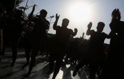هتافات ضد إيران.. واشتباك مع الأمن يخلف 10 إصابات في احتجاجات بكربلاء