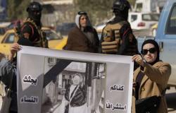 عراقيون يحتجون على العنف ضد المرأة
