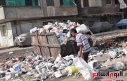بالصور..القمامة تغطى شوارع شبرا الخيمة بالقليوبية