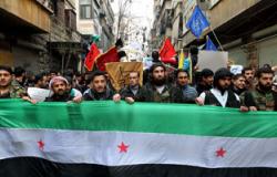 الآلاف يتظاهرون بالعراق احتجاجا على الضربة العسكرية المحتملة ضد سوريا