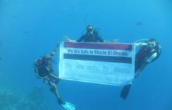 بالصور.. حملة “شرم آمنة” تصل أعماق البحر الأحمر.. وغواصين يحملون أعلام مصر تحت الماء