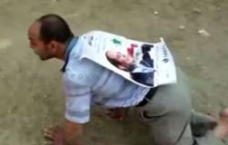 بالفيديو.. معاق الاستفتاء” يحمل صورة السيسى على ظهره ويشكره على تحمله مسئولية مصر
