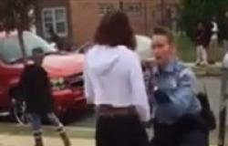 بالفيديو والصور.. شرطية تنهي «خناقة» بين فتاتين بـ«وصلة رقص»